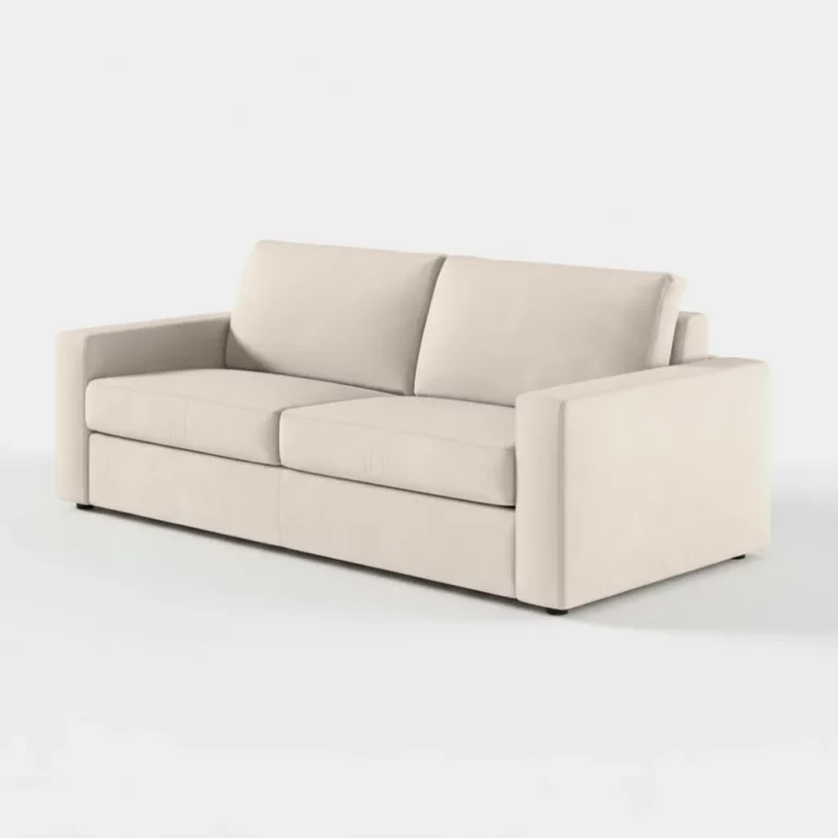 Canapé Adele Maisons du Monde en tissu beige, silhouette droite, accoudoirs rectilignes, coussins d’assise et dossier, piètement discret en métal.