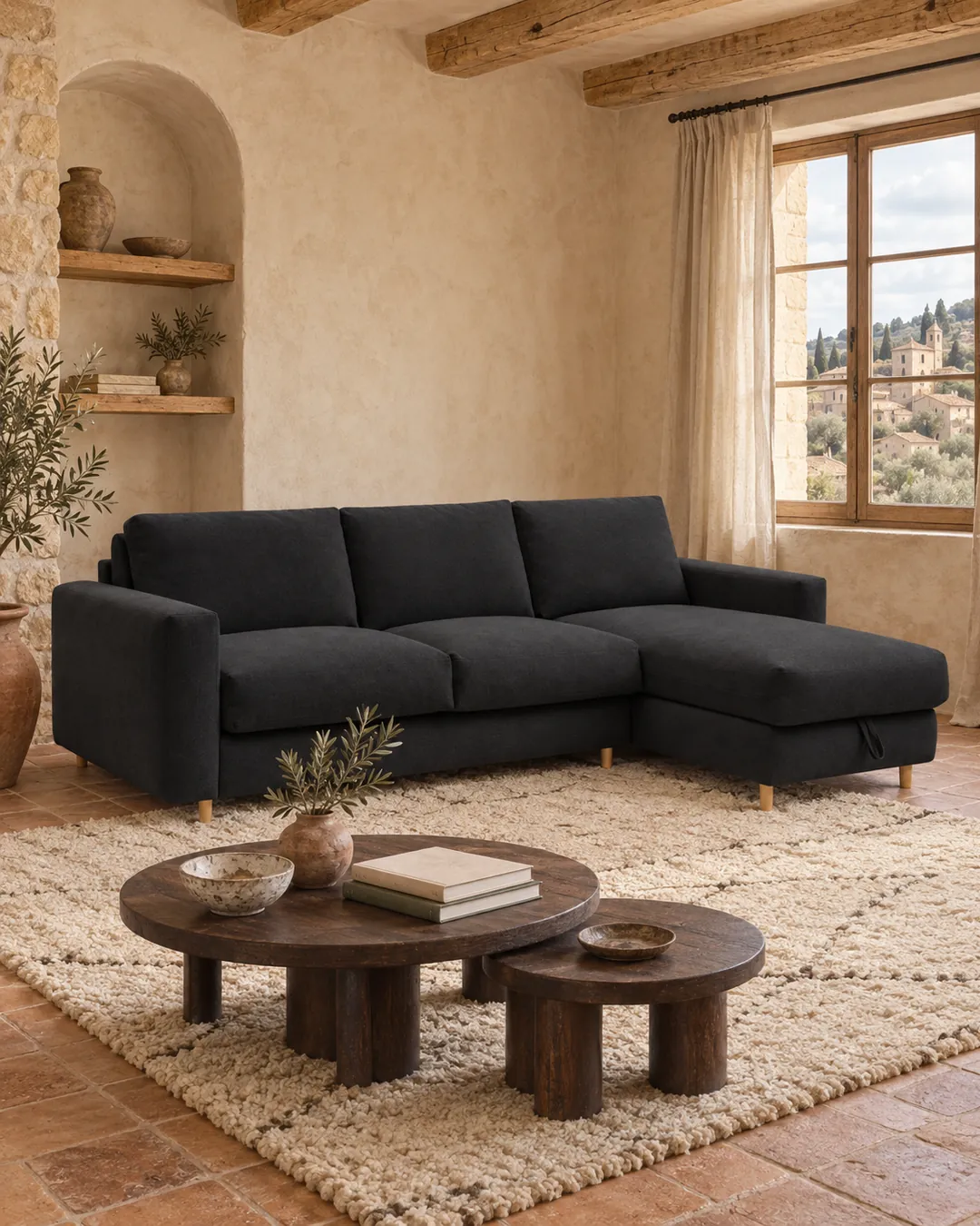 Plan rapproché du canapé Cocoone Bobochic d'angle convertible en tissu, coloris noir, style minimaliste, dans un salon (mise en situation illustrée par IA)