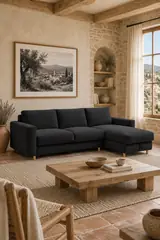 Vue d'ensemble du canapé Cocoone Bobochic d'angle convertible en tissu, coloris noir, style minimaliste, dans un salon (mise en situation illustrée par IA)
