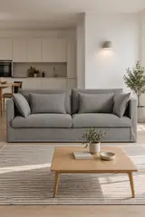 Vue d'ensemble du canapé Camille La Redoute 3 places en tissu, coloris anthracite, style campagne chic, dans un studio de 25 m² (mise en situation illustrée par IA)