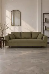 Vue d'ensemble du canapé Rune Maisons du Monde 3 places en velours, coloris vert, style vintage, dans un ancien atelier transformé en logement (mise en situation illustrée par IA)