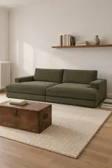 Vue d'ensemble du canapé Leonard Bobochic 4 places en velours, coloris vert clair, style contemporain, dans un petit salon d'appartement (mise en situation illustrée par IA)