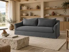 Canapé Anaelle Maisons du Monde, droit convertible, lin lavé, coloris anthracite, mise en situation dans un salon (illustration IA 3)