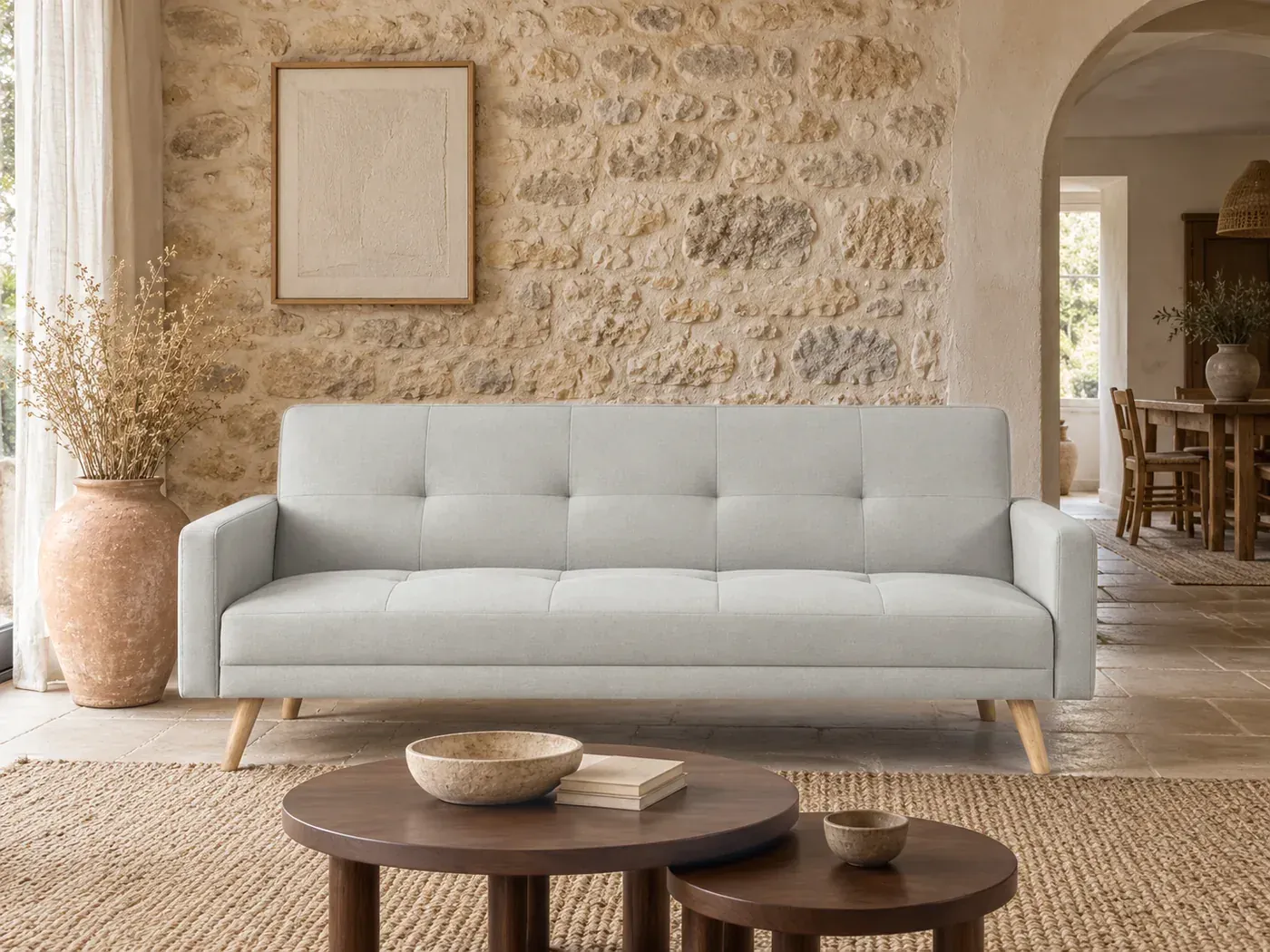 Wooden, 3 places droit convertible, tissu, coloris beige, dans un salon en pierre blonde avec une arche chaulée