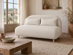 Canapé Ponio Maisons du Monde, 2 places droit convertible, bouclette, coloris ecru, mise en situation dans un salon (illustration IA 7)