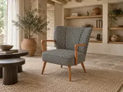 Fauteuil Meyer Maisons du Monde, fauteuil, tissu, coloris noir et blanc (motifs graphiques), mise en situation dans un salon (illustration IA 6)