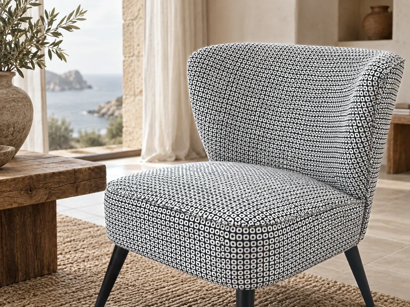 Palm, fauteuil, velours, coloris noir et blanc : gros plan sur les coussins