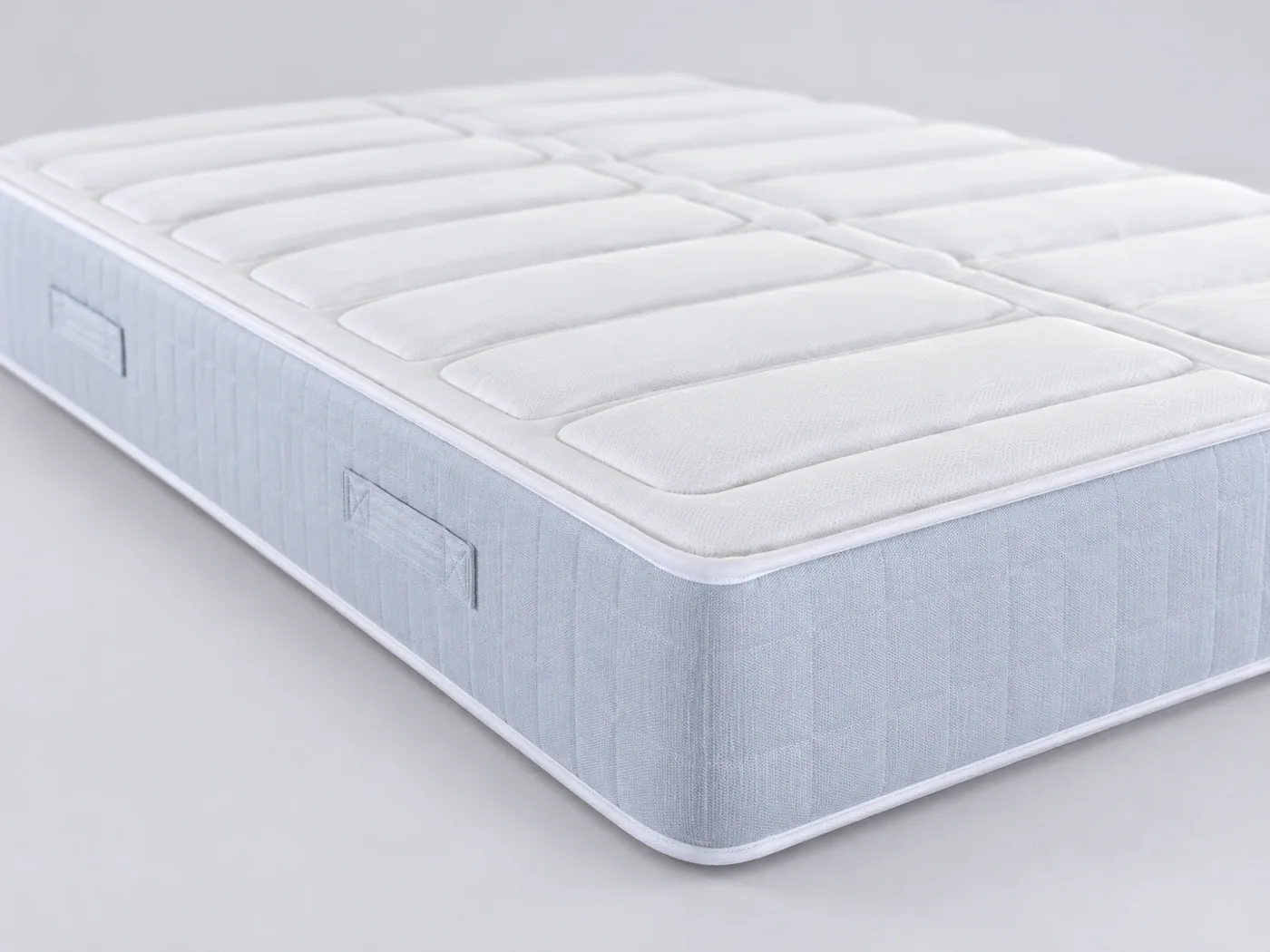 Matelas Ben Miliboo, gros plan sur le flanc : épaisseur de 25 cm et poignées