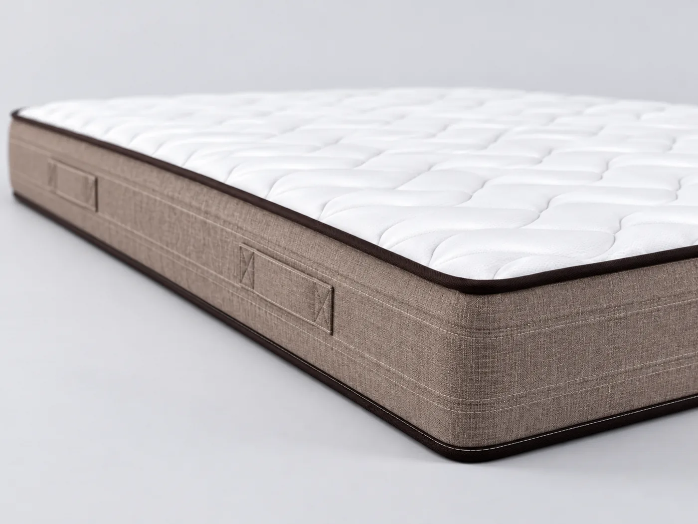 Matelas Bull Essentiel Maisons du Monde, gros plan sur le flanc : épaisseur de 19 cm et poignées